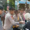 Polda Metro Jaya Bagikan Makanan Gratis di Bundaran HI